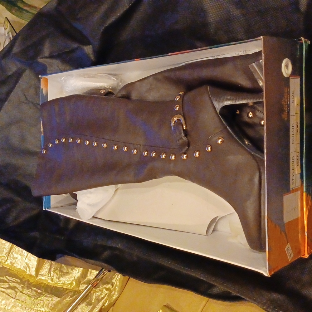 Knee high brown leather boots